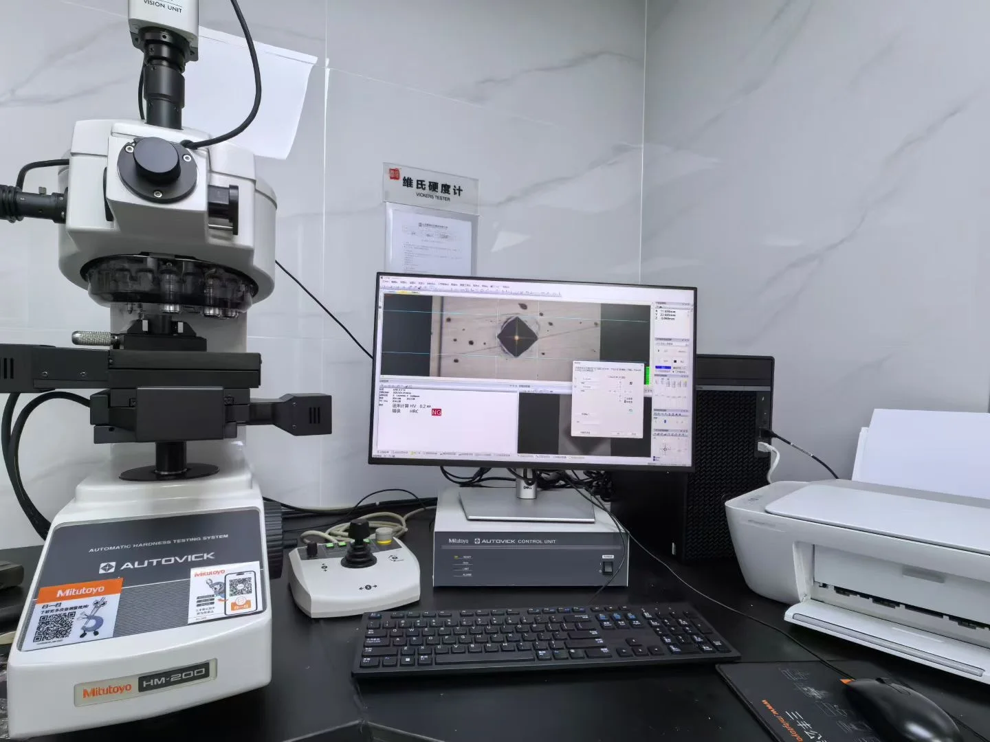 Vickers hardness tester