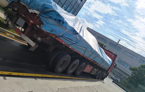 Covered truck on the weighbridge for the loaded weighing.